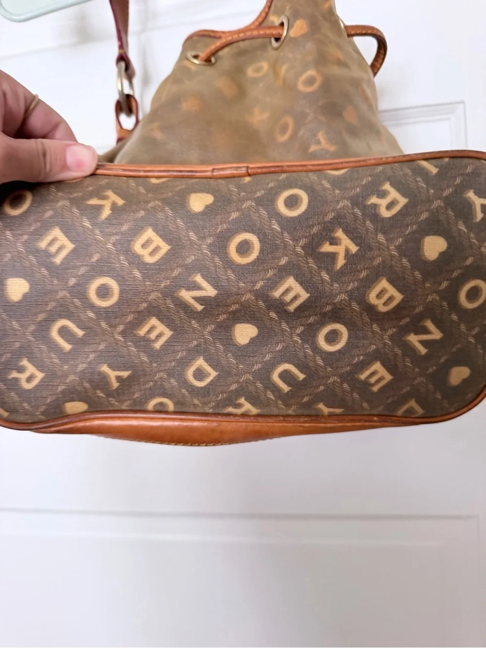 Vintage Dooney & Bourke crossword bucket bag